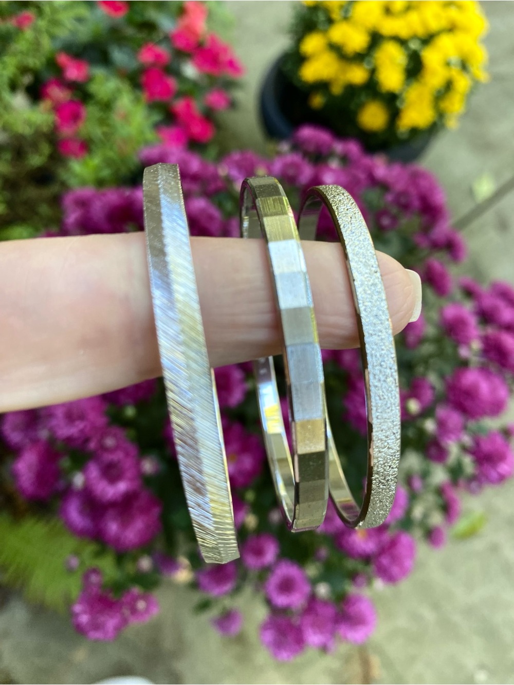 3 VTG MONET silver tone bangles. Multi- textured. 2 small, 1 Medium. STAMPED.